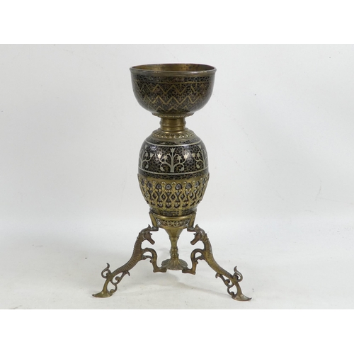 11 - An early 20th century Turkish brass and enamel lamp base - decorated with foliage and flowers on a l... 