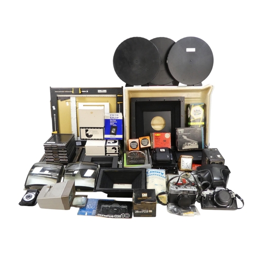 114 - A quantity of peripheral camera photographic equipment - including large format camera cassettes, mo... 