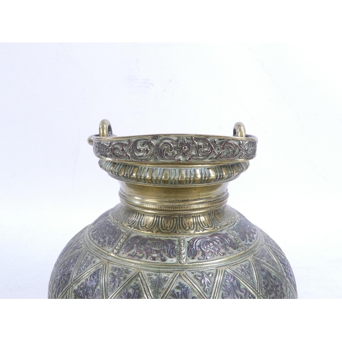 12 - A late 19th century cast brass Persian jug - with decorative copper foliate within lozenge panels an... 