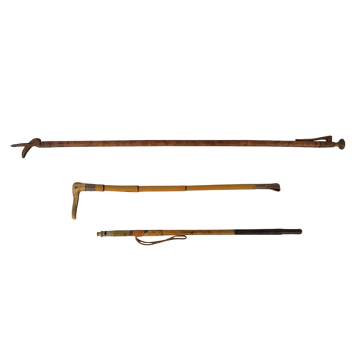 15 - An early 20th century riding crop - bamboo and fitted with a whistle to the handle, together with a ... 