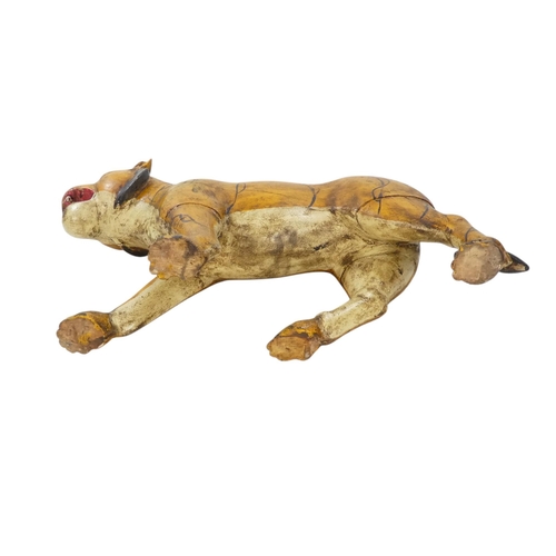 154 - A 20th century carved hardwood and polychrome painted tiger - 59cm wide, together with another of an... 