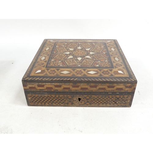 18 - An early 20th century Damascus ware wooden and inlaid box - square, the hinged cover incorporating m... 