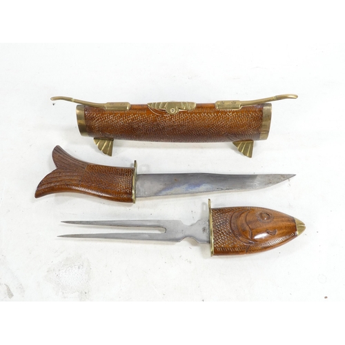 21 - A 20th century Indian carving set - modelled as a fish with brass mounts.