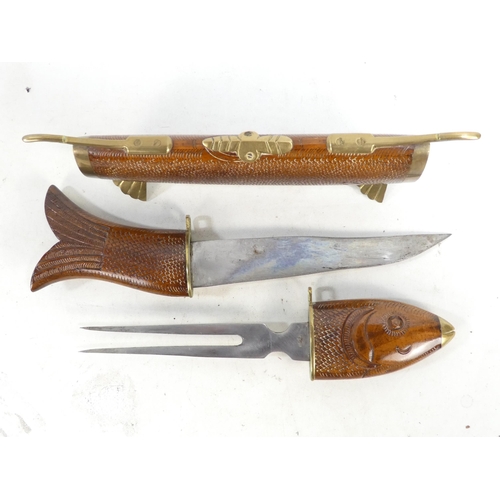 21 - A 20th century Indian carving set - modelled as a fish with brass mounts.