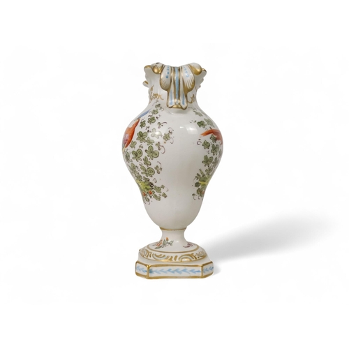 210 - A Samson style vase - of baluster form with foliate neck and raised on a square base with canted cor... 