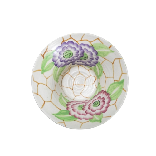 211 - An early 20th century pottery bowl by G Radford - decorated with flowers, 17cm diameter.