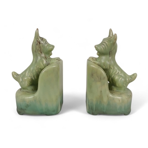 218 - A pair of Beswick bookends - modelled as Scottie dogs with a green graduated marbled finish, 16cm hi... 