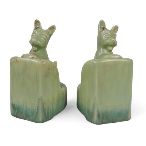 218 - A pair of Beswick bookends - modelled as Scottie dogs with a green graduated marbled finish, 16cm hi... 