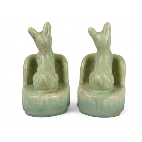 218 - A pair of Beswick bookends - modelled as Scottie dogs with a green graduated marbled finish, 16cm hi... 