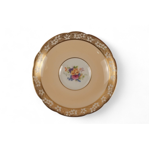 228 - An early 20th century Paragon china part tea service - decorated with sprigs of flowers with salmon ... 