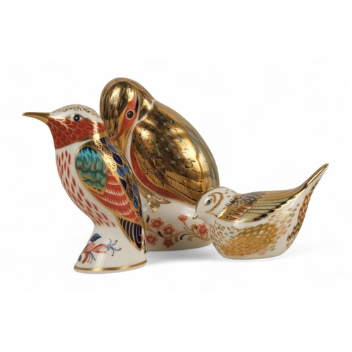 235 - A Royal Crown Derby kingfisher paperweight - perched with a fish, 11cm high, together with two furth... 