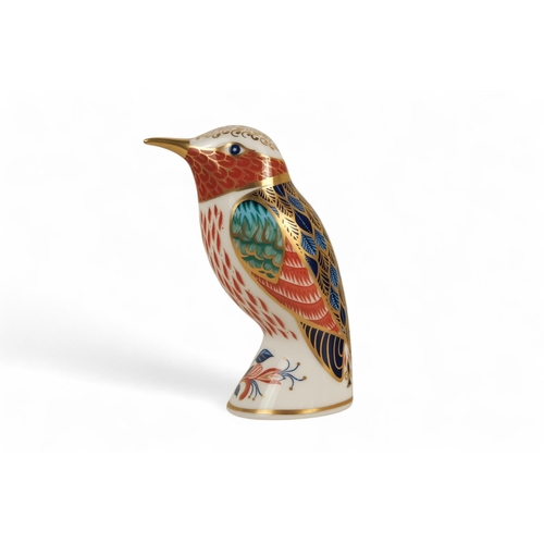 235 - A Royal Crown Derby kingfisher paperweight - perched with a fish, 11cm high, together with two furth... 