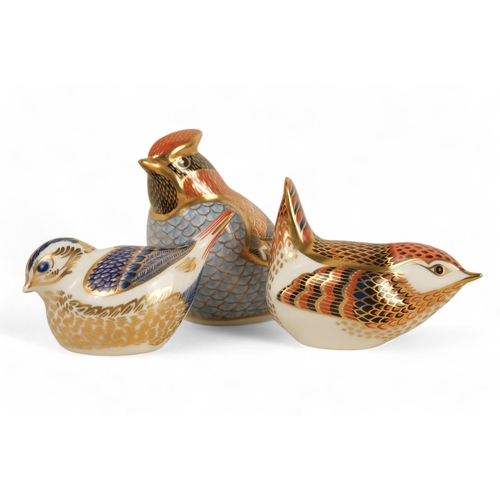 236 - A Royal Crown Derby wren paperweight - 6cm high, together with two further birds. (3)