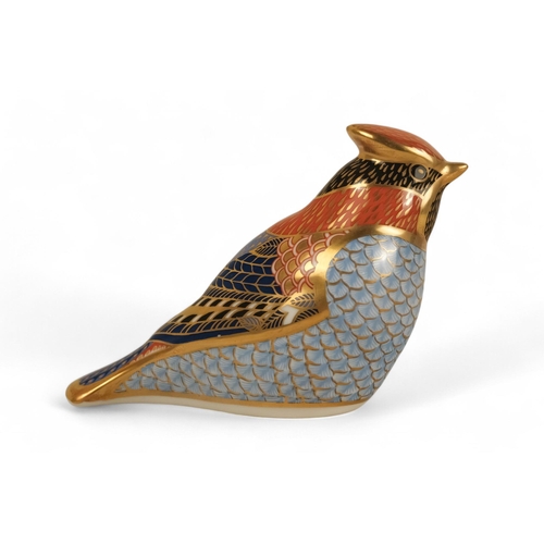 236 - A Royal Crown Derby wren paperweight - 6cm high, together with two further birds. (3)