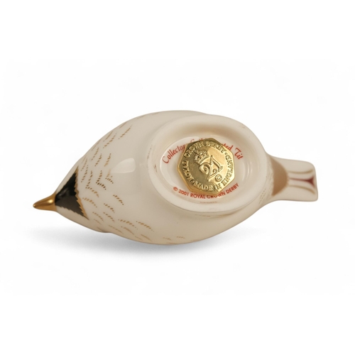 237 - A Royal Crown Derby pheasant paperweight - 7cm high, together with two further birds. (3)