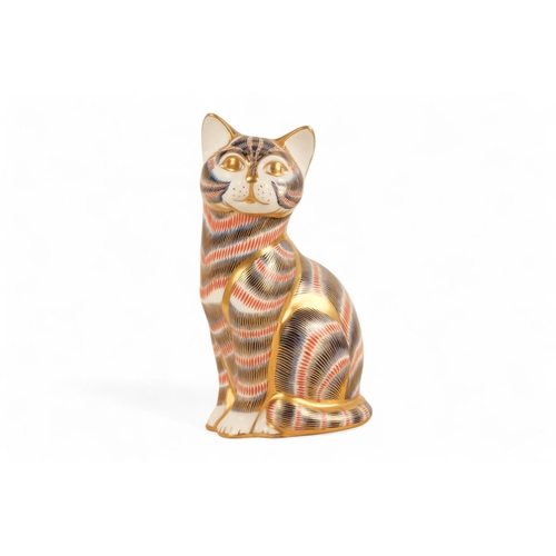 238 - A Royal Crown Derby cat paperweight - seated, 14cm high, together with three further various cats. (... 