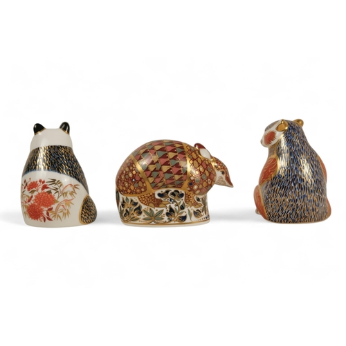 239 - A Royal Crown Derby armadillo paperweight - 9cm high, together with a panda and a bear. (3)