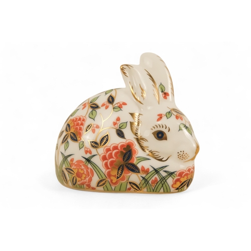 242 - A Royal Crown Derby rabbit paperweight - 7cm high, together with three others in the form of a robin... 