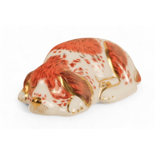 242 - A Royal Crown Derby rabbit paperweight - 7cm high, together with three others in the form of a robin... 