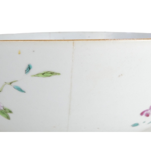 303 - A 19th century Chinese famille verte bowl - decorated in enamels with flowers and a bridge, raised o... 