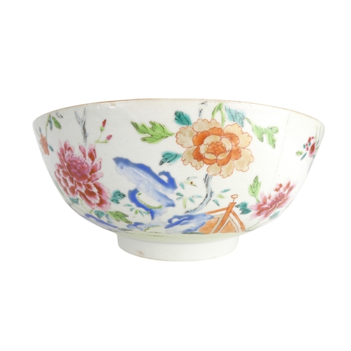 303 - A 19th century Chinese famille verte bowl - decorated in enamels with flowers and a bridge, raised o... 