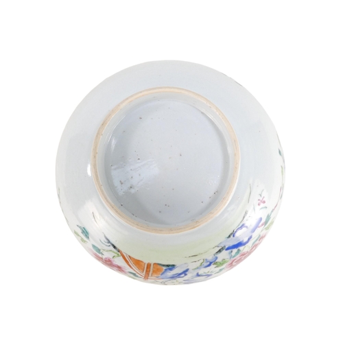 303 - A 19th century Chinese famille verte bowl - decorated in enamels with flowers and a bridge, raised o... 