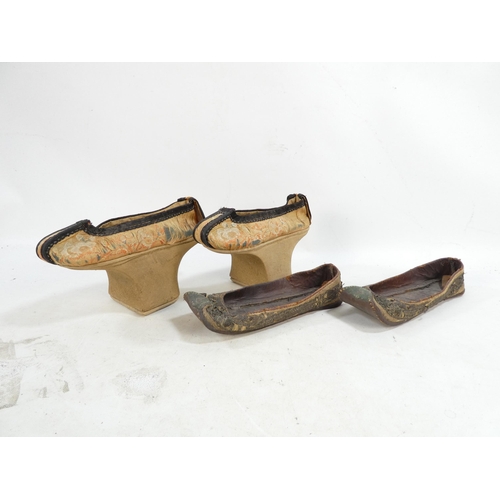 305 - A pair of early 20th century Chinese Manchu platform shoes - the upper with a floral silk design on ... 