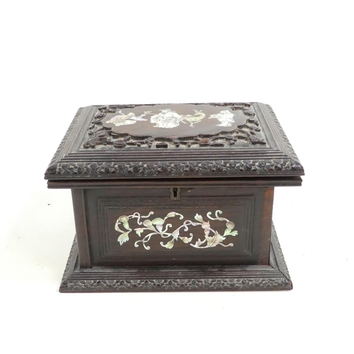 306 - A late 19th century hardwood jewellery box - the hinged cover inset with mother-of-pearl scholar fig... 