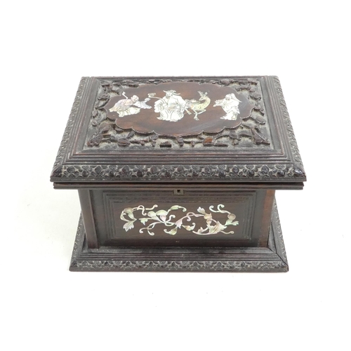 306 - A late 19th century hardwood jewellery box - the hinged cover inset with mother-of-pearl scholar fig... 