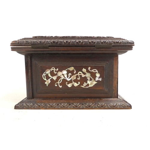 306 - A late 19th century hardwood jewellery box - the hinged cover inset with mother-of-pearl scholar fig... 