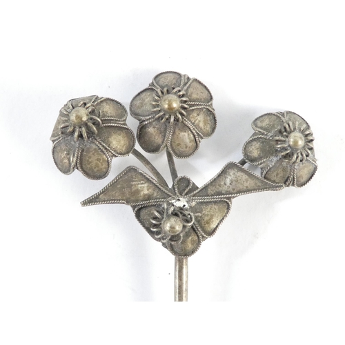 308 - Three various Chinese white metal hair pins - one modelled as blooming flowers, the other two as fol... 