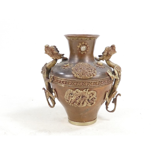 309 - A Chinese copper and brass vase - mounted with dragons and cabochon hardstones, 20cm high.