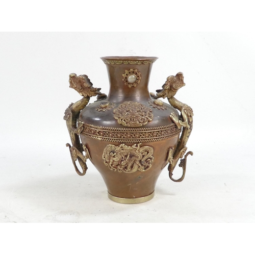 309 - A Chinese copper and brass vase - mounted with dragons and cabochon hardstones, 20cm high.