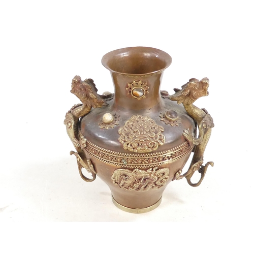 309 - A Chinese copper and brass vase - mounted with dragons and cabochon hardstones, 20cm high.