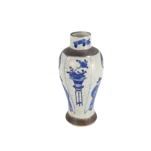 310 - A Chinese Guangxu period blue and white crackle glaze vase - of baluster form decorated with scholar... 