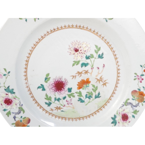 311 - A 19th century famille verte plate - decorated with chrysanthemums, 35cm diameter.