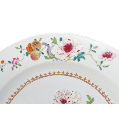 311 - A 19th century famille verte plate - decorated with chrysanthemums, 35cm diameter.