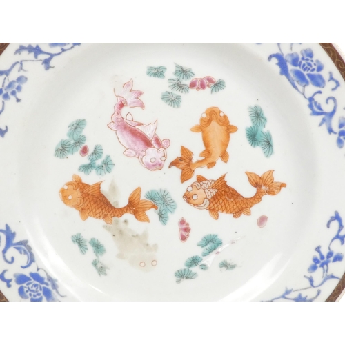 314 - A 19th century Chinese plate - decorated in enamels with carp, 23cm diameter.