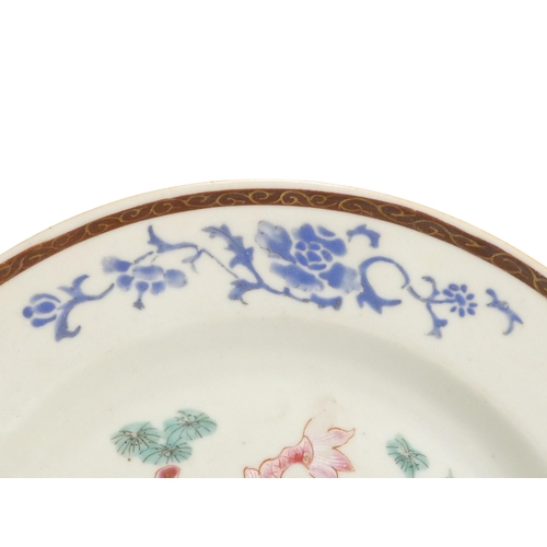 314 - A 19th century Chinese plate - decorated in enamels with carp, 23cm diameter.