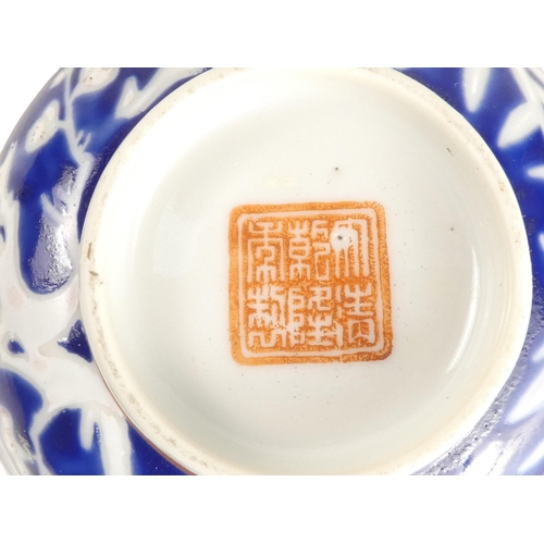 318 - An early 20th century Chinese blue and white rice bowl - with bamboo decoration and seal mark to bas... 