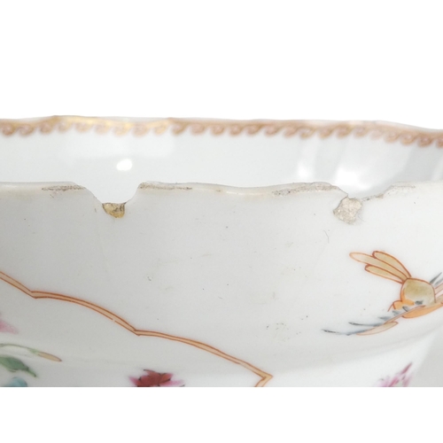 319 - An early 19th century famille rose rice bowl - decorated in enamels with birds and flowers and with ... 