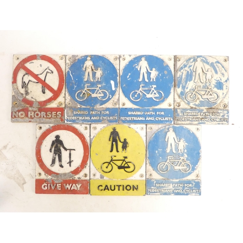 3 - Seven various cast metal pedestrian signs.