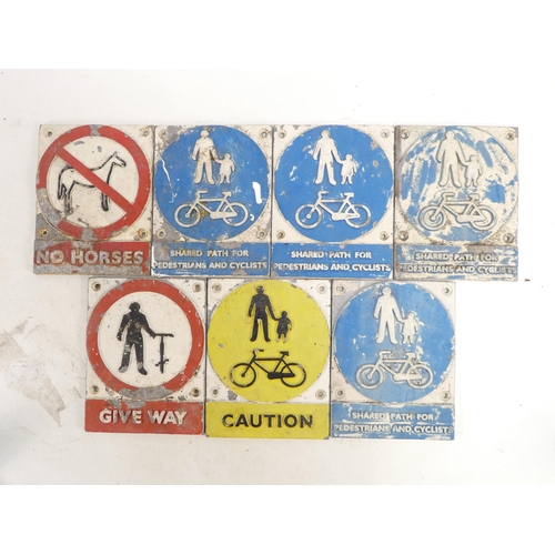 3 - Seven various cast metal pedestrian signs.