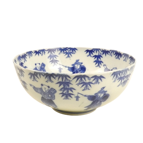 321 - A 19th century Chinese blue and white bowl - decorated with seven figures below wisteria, the centre... 