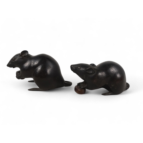 328 - A pair of Japanese bronze figures of rats - Meiji period (1868-1912), each modelled holding a nut, e... 