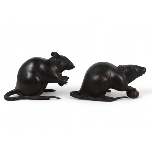 328 - A pair of Japanese bronze figures of rats - Meiji period (1868-1912), each modelled holding a nut, e... 