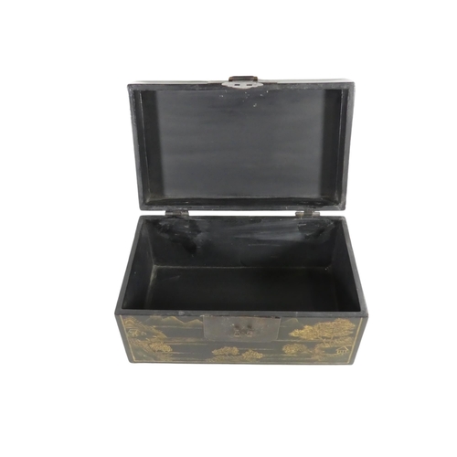 335 - A 20th century black lacquer chinoiserie box - of rectangular form and decorated with landscape scen... 