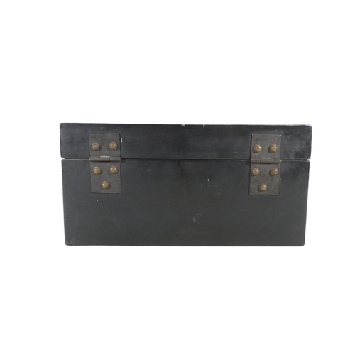 335 - A 20th century black lacquer chinoiserie box - of rectangular form and decorated with landscape scen... 