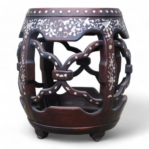 341 - A late 19th century Chinese hardwood barrel stool - with marble inset top with foliate mother-of-pea... 