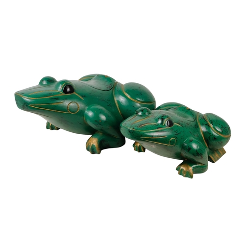 36 - An Indonesian green painted wooden frog - with gilt decoration and a hinged compartment to its back,... 